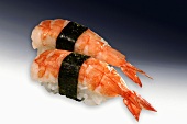 Two crab nigiri sushi (with crab tails)