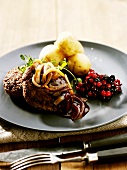 Burgers with onion sauce & boiled potatoes (in their skins)