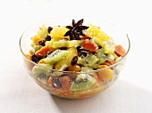Exotic fruit salad in a glass bowl