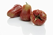 Three red Java apples