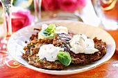 Cereal and vegetable rosti with sour cream
