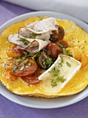 Omelette with ham, tomatoes and Camembert