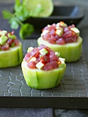 Cucumber towers topped with tuna tartare