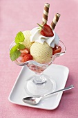 Vanilla ice cream with fresh strawberries