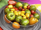 Various kinds of tomatoes in a glass dish