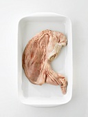 Saumagen (stuffed pig's stomach) in a baking dish