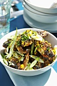 Grilled chicken wings with spring onions