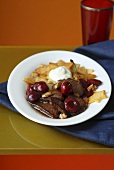 Venison with cherry sauce and fried potato stars