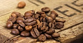 Coffee beans on a wooden board