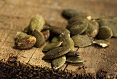 Pumpkin seeds on a wooden board