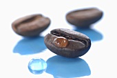 Coffee beans with drops of water