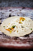 Quesadilla with grated cheese and pumpkin flowers