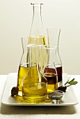 Various types of oil in carafes