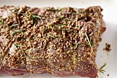 Raw beef with mustard and rosemary
