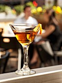 A Manhattan Martini on a restaurant terrace