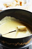 Cheese fondue with bead