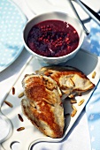 Chicken with pine nuts and blackberry sauce