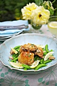 Chicken with garlic, lemons and pea pods
