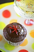 A chilli-chocolate muffin and champagne