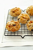 Yeast cakes made with dried fruit on a wire rack