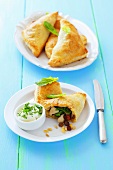 Puff pastry samosas stuffed with chicken, spinach and raisins