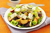 Salad with plums, beetroot and feta