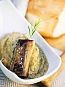 Aubergine puree with fried aubergine slices and rosemary