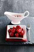 Strawberry dessert with fruit sauce
