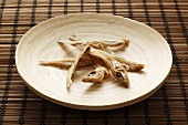 Roasted whiting on a plate