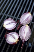 Red onions on a barbeque