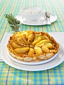 A pear and rosemary tart with whipped cream