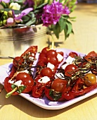 Peppers stuffed with tomatoes, feta and rosemary