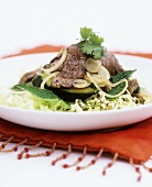 Strips of beef fillet on courgettes and cabbage salad