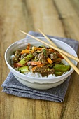 Bowl of cooked beef, vegetables and rice