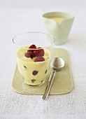 White wine sabayon with raspberries in a glass