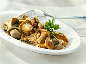 Fried mushrooms with parsley on a platter