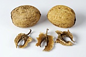 Two whole walnuts with skin