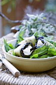 Grilled aubergine slices stuffed with herbs & soft cheese