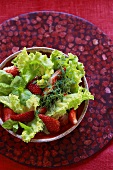 Salad leaves with strawberries and cress