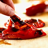 Skinning grilled peppers