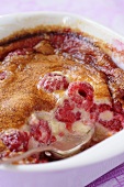 Raspberry clafouti in a baking dish