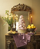Tower of poached meringues, chocolate cream, flowers, sugar pearls