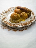 A piece of apricot tart with cinnamon