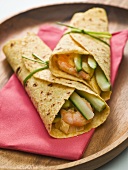 Two wraps with prawn and cucumber filling
