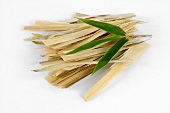 Strips of bamboo with bamboo leaf