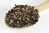Black cohosh root on a wooden spoon
