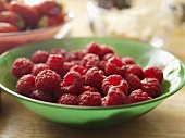 Fresh raspberries in a glass dish