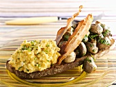 Scrambled egg, bacon & mushrooms on toasted wholemeal bread