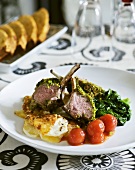 A rack of lamb with a mustard & pistachio crust, spinach and gratinated potato