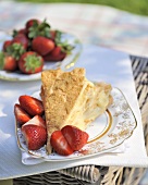 Piece of honey and walnut meringue with fresh strawberries